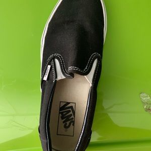 Black slip on vans